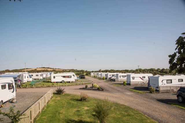 Dozens of caravans on a neatly mown caravan site on Anglesey
